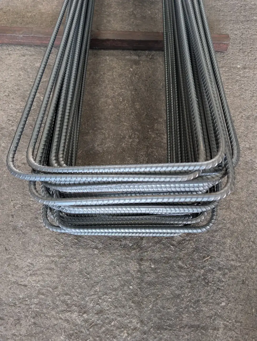 Bundle of U-shaped cut and bend rebar laid out ready for delivery to site