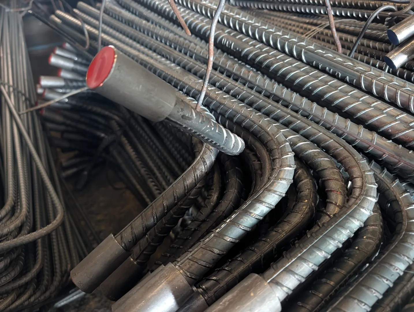 Rebar couplers fitted to the ends of bent reinforcement bars