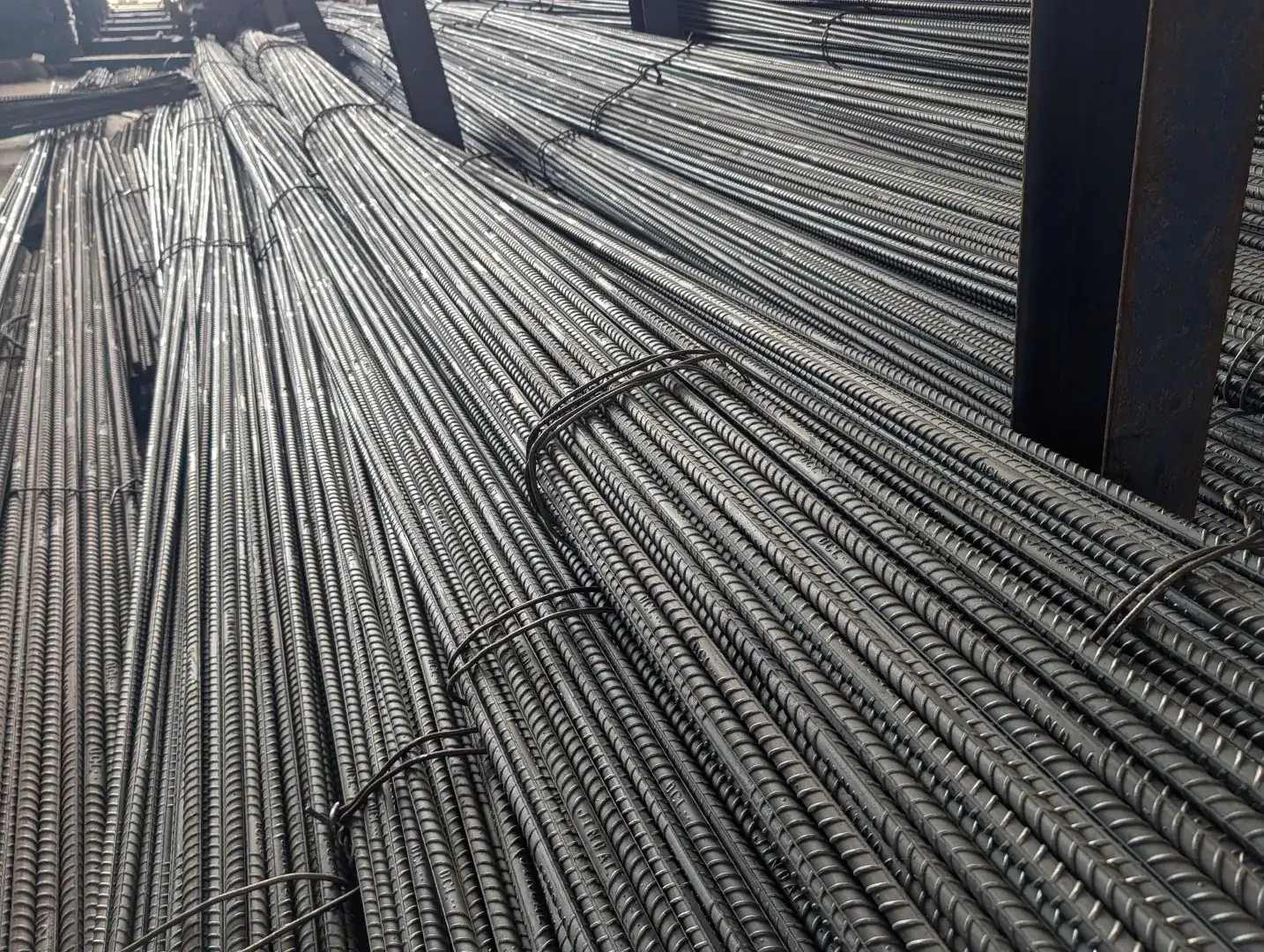 Tied bundles of straight deformed rebar in stock